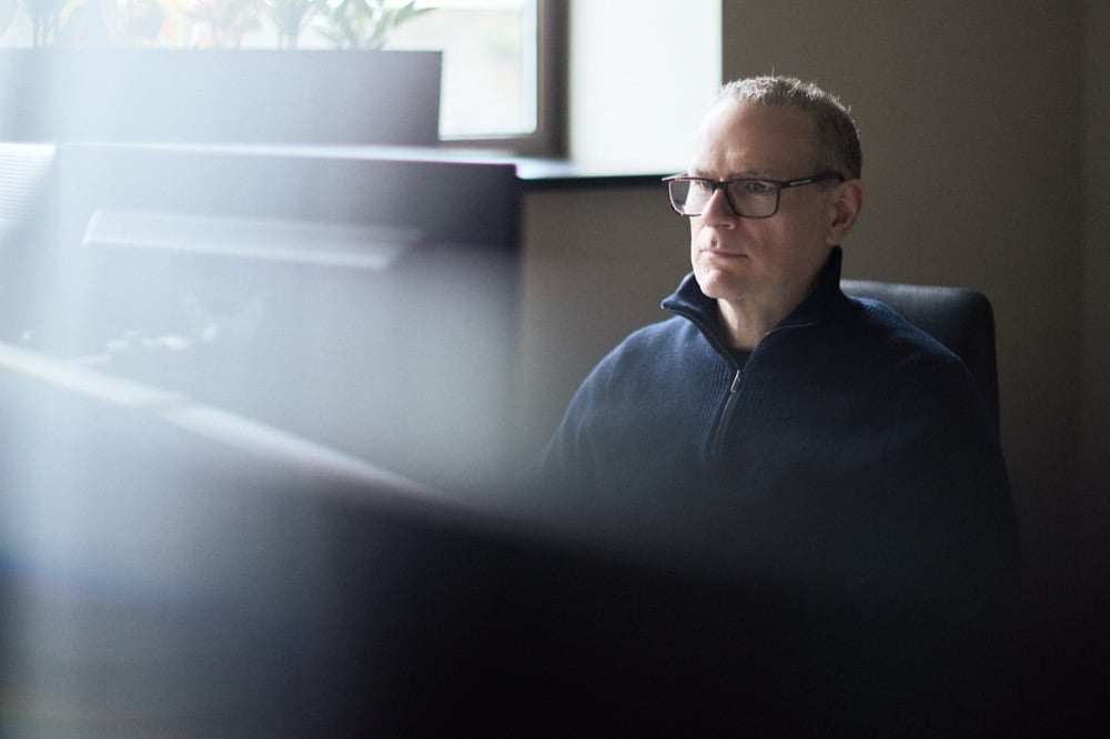 Paul Patterson at work in the Oracle Finance office