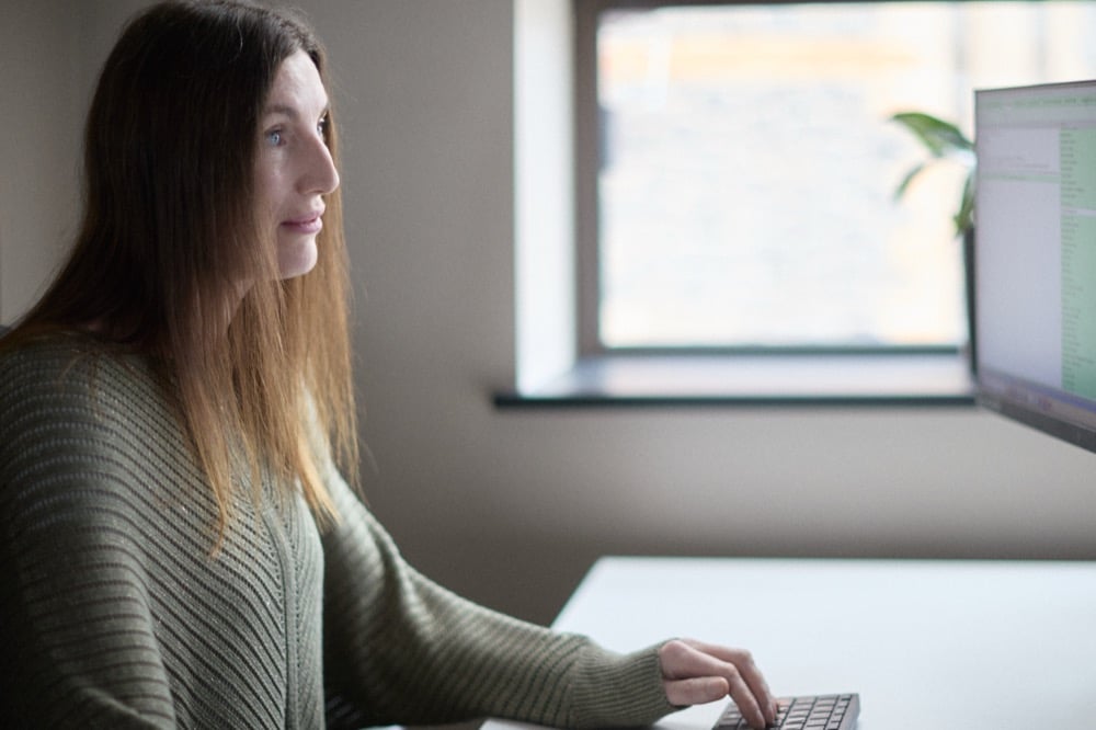 Lindsey Salmon at work in the Oracle Finance office