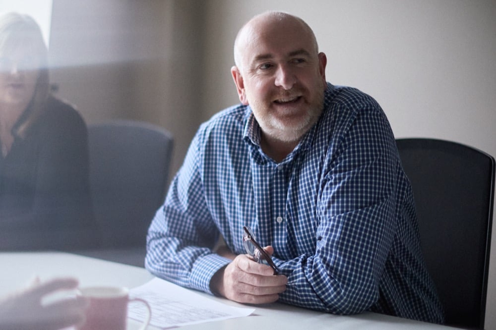 Conor Burke at work in the Oracle Finance office