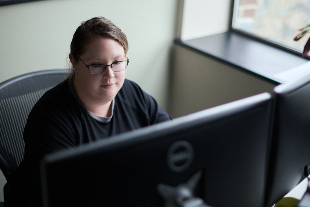 Tabby Dowinton at work in the Oracle Finance office